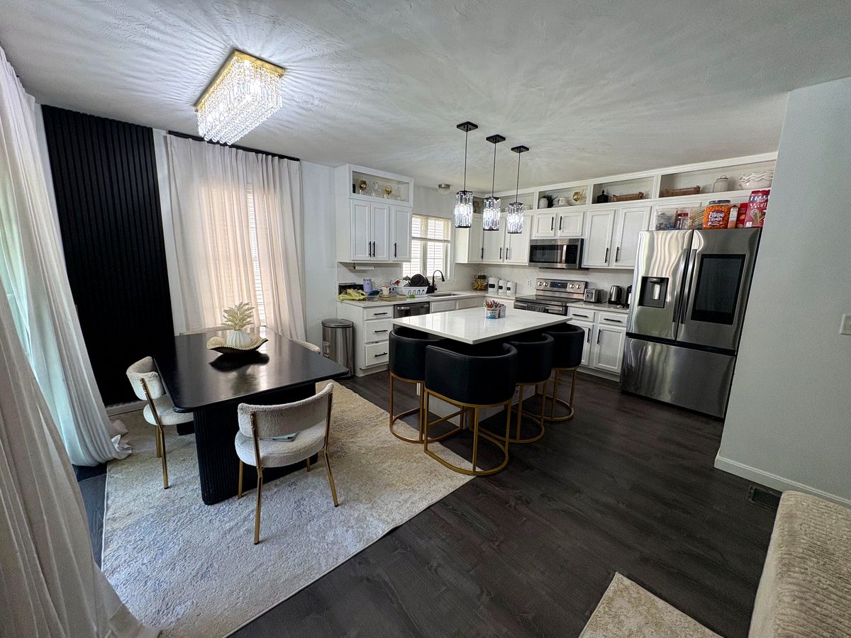 Bright, modern kitchen and dining room cleaned by RiseUp Cleaning in Worcester County